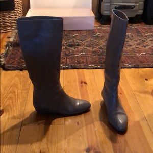 Lightly worn grey boots